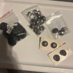 Set of black and silver buttons